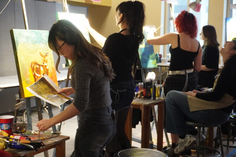 student artists working at their easels PHOTO: CHRISTINE LAYNE