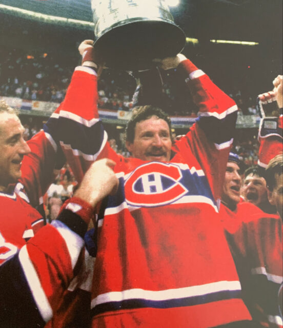 Larry Robinson holding the Stanley Cup