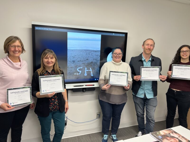 SH Graduates holding their certificates of completion