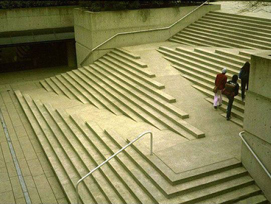Staircase that shows ramp nicely designed into the staircase.