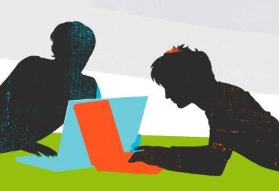 two people at computer